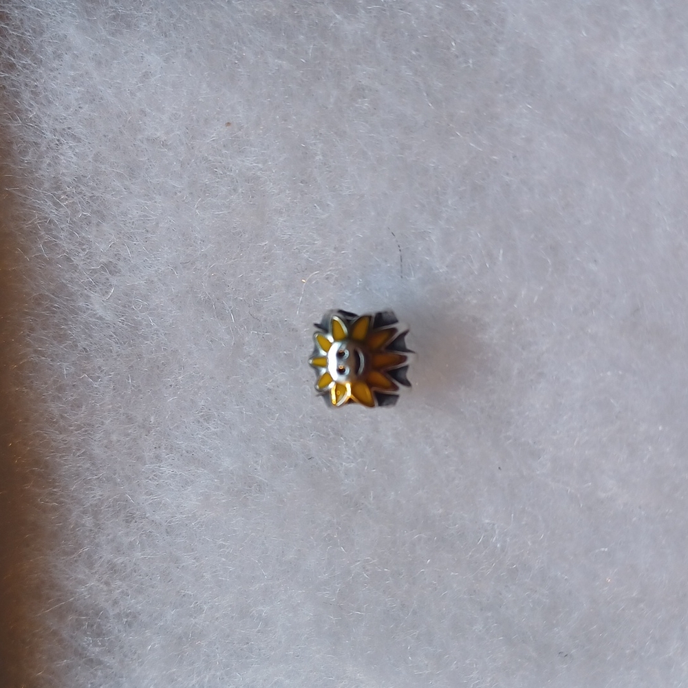 Pandora rare retired smiling sunshine charm